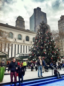 The NY Public Library makes a dramatic backdrop for the Bryant Park Christmas tree.